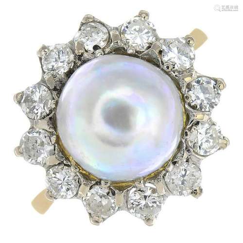 A cultured pearl and diamond cluster ring. Estimated