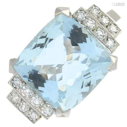 An aquamarine and diamond ring.Aquamarine calculated