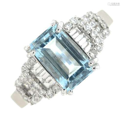 An 18ct gold aquamarine and diamond ring.Aquamarine