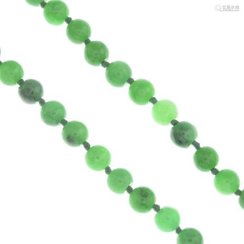 A jade single-strand bead necklace, with diamond clasp.