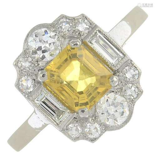 A yellow sapphire and diamond dress ring.Sapphire