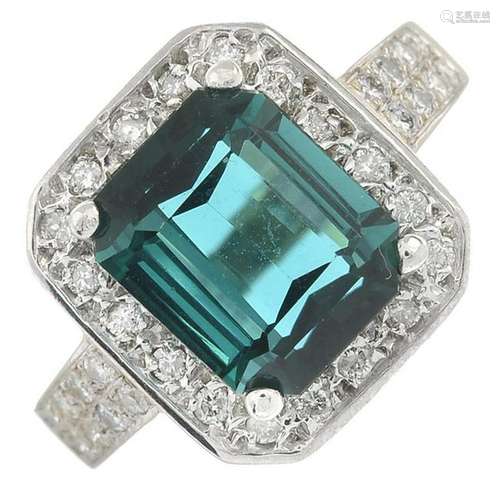 A green tourmaline and diamond cluster ring.Tourmaline