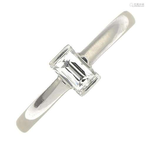 A platinum tycoon-cut diamond single-stone ring.Laser