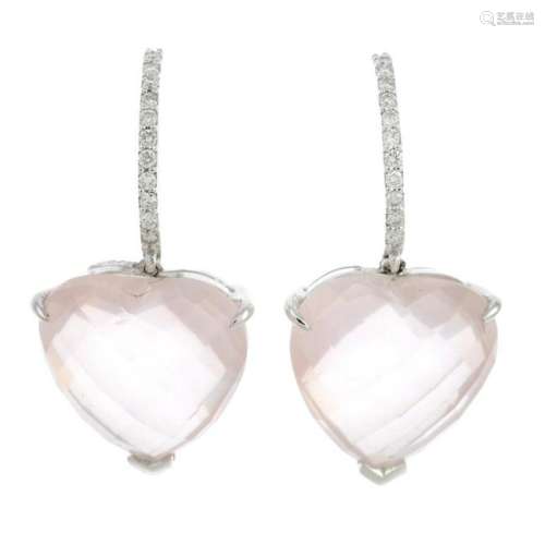 A pair of rose quartz and diamond earrings.Quartz total