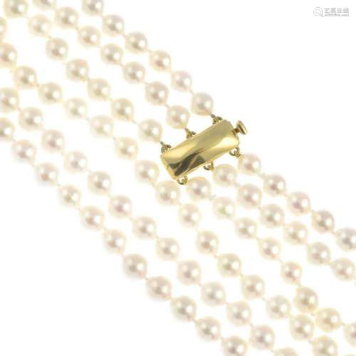 A cultured pearl three-row necklace. Cultured pearls