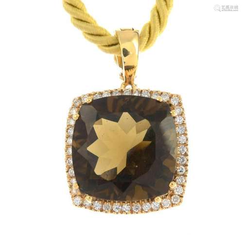A 9ct gold smoky quartz and diamond pendant, suspended