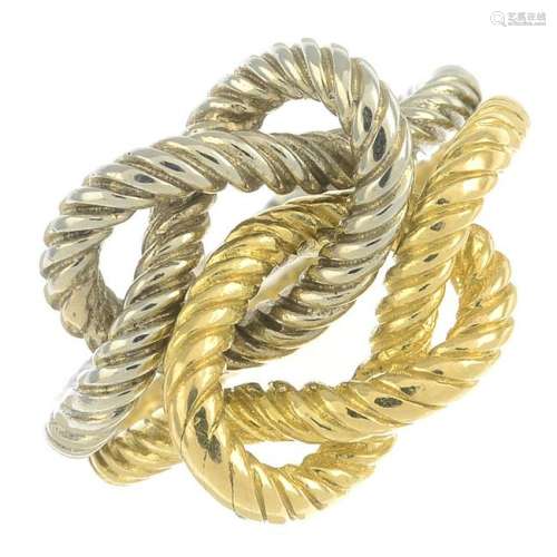 An 18ct gold bi-colour 'Knot' ring, by Cartier. Import