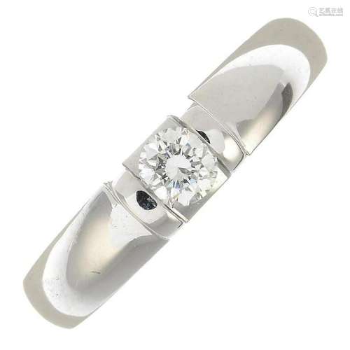 A brilliant-cut diamond single-stone band ring, by