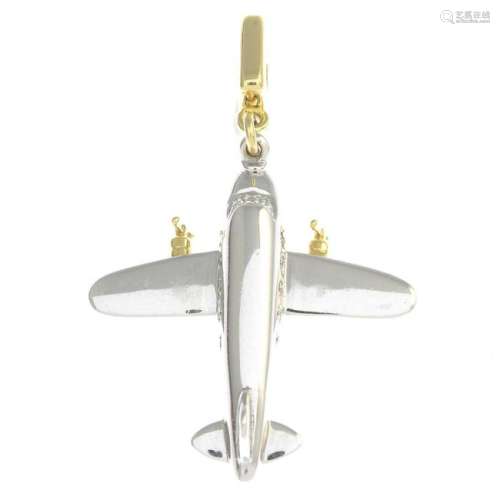 A diamond aeroplane charm, by Louis Vuitton.Signed