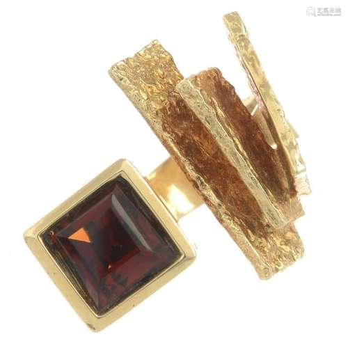 A 1970s 14ct gold garnet dress ring, by Ole