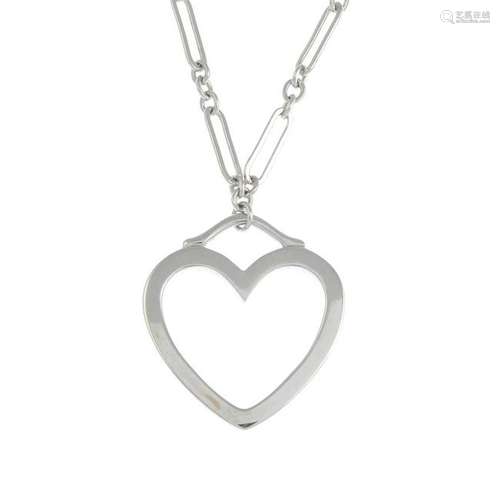 A heart pendant, suspended from an integral chain, by