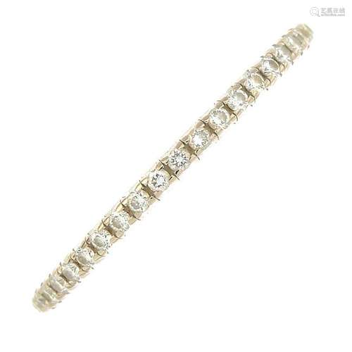 An 18ct gold diamond full eternity ring, by Tiffany &