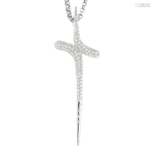 An 18ct gold diamond stylised cross pendant, suspended