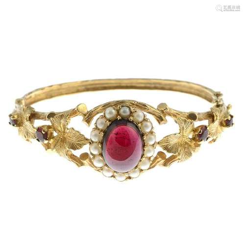 A 9ct gold garnet and split pearl naturalistic