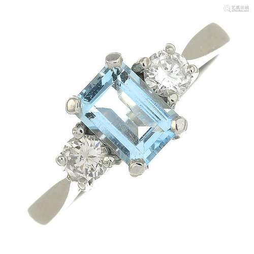 A platinum aquamarine and diamond three-stone