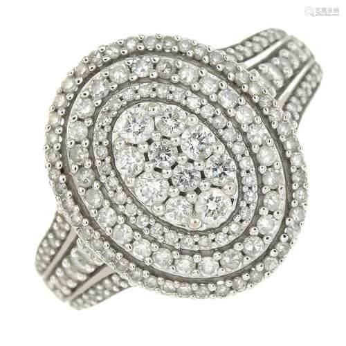 An 18ct gold diamond cluster ring.Total diamond weight