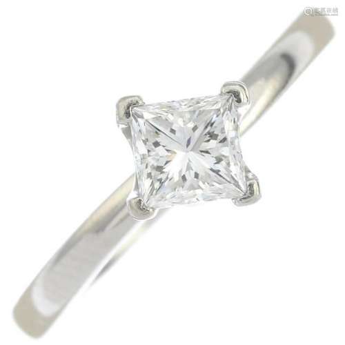 A platinum square-shape diamond single-stone ring. With