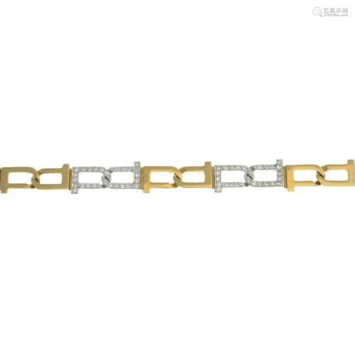 A diamond bracelet.Estimated total diamond weight