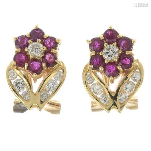 A pair of ruby and diamond floral cluster