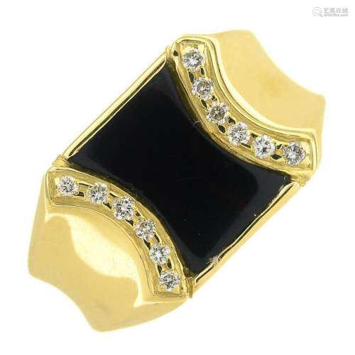 An 18ct gold onyx and diamond signet ring.Estimated