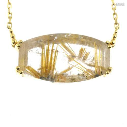 An 18ct gold rutilated quartz pendant, suspended from a