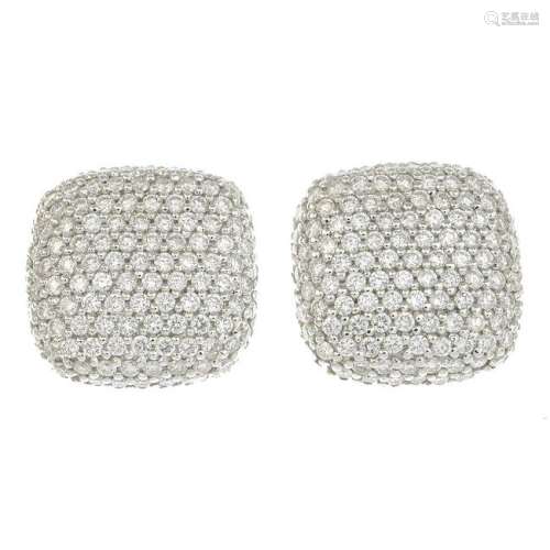 A pair of gold pave-set diamond earrings.Estimated