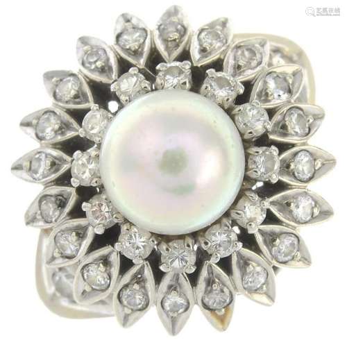A cultured pearl and diamond dress ring. With inner