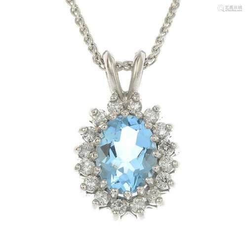 An aquamarine and diamond cluster pendant, suspended