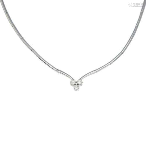 A diamond trefoil necklace.Total diamond weight 0.33ct,