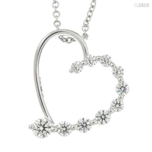 An openwork heart pendant, with graduated brilliant-cut