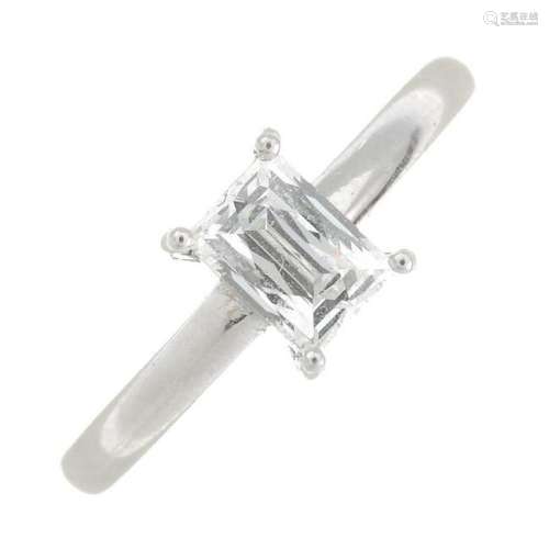 A platinum tycoon-cut diamond single-stone ring.Laser