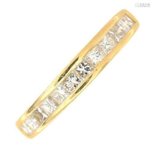 An 18ct gold square-shape diamond half eternity