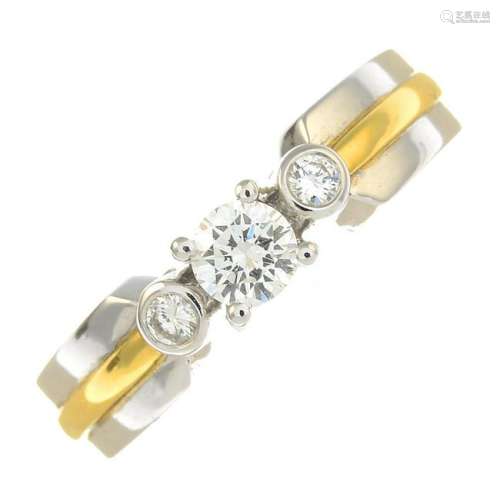 An 18ct gold diamond three-stone ring.Total diamond