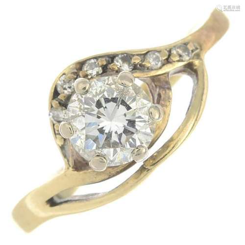 A brilliant-cut diamond dress ring.Principal diamond