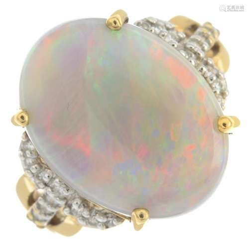 An opal and diamond dress ring.Estimated total diamond