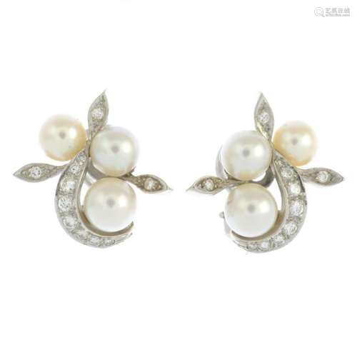 A pair of cultured pearl and diamond earrings.With