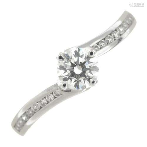 An 18ct gold brilliant-cut diamond dress ring.Laser