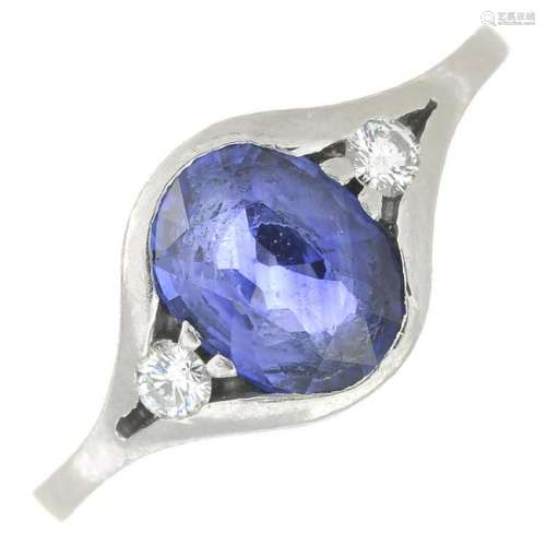 A platinum sapphire and diamond ring.Sapphire