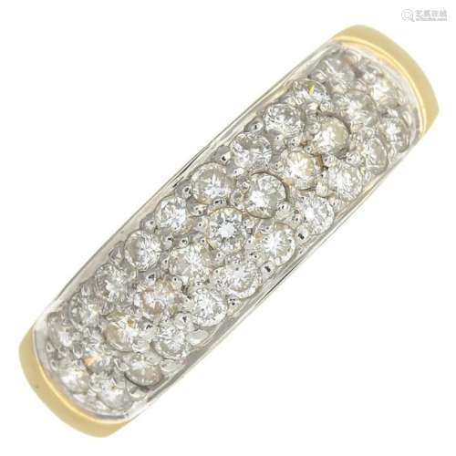 An 18ct gold pave-set diamond band ring.Total diamond