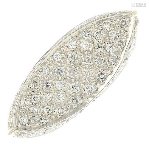 An 18ct gold pave-set diamond dress ring.Total diamond