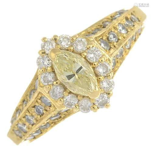 A 'coloured' diamond and diamond cluster ring.'yellow'