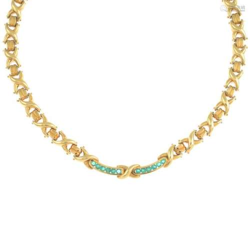 An emerald necklace. Length 42cms. 74gms.
