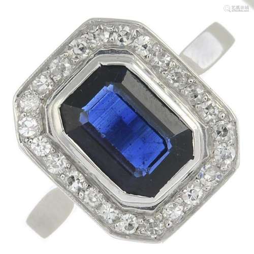 A sapphire and diamond cluster ring.Sapphire calculated