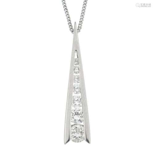 A platinum brilliant-cut diamond pendant, suspended