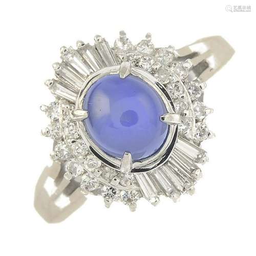 A star sapphire and diamond dress ring.Sapphire