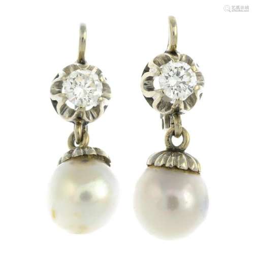 A pair of cultured pearl and diamond earrings.