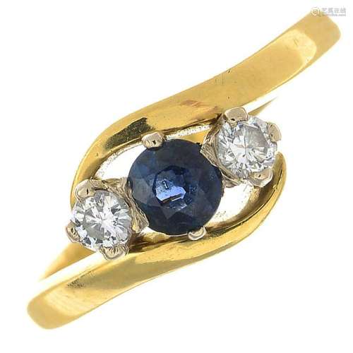 An 18ct gold sapphire and diamond three-stone