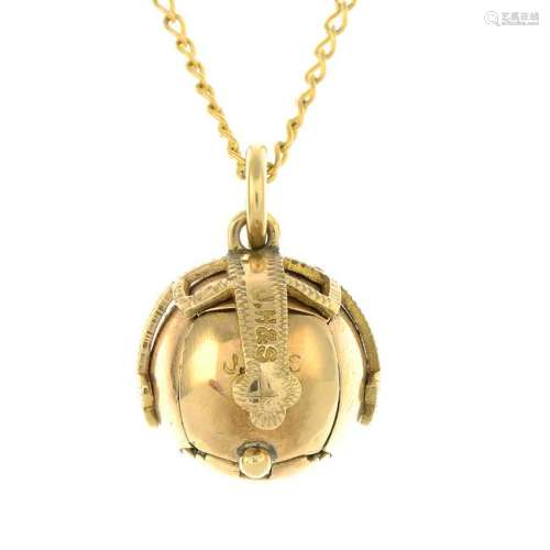 A mid 20th century Masonic ball pendant, suspended from