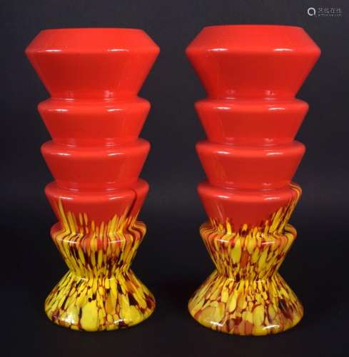 A PAIR OF 1950S RED AND YELLOW GLASS VASES. 19 cm high.