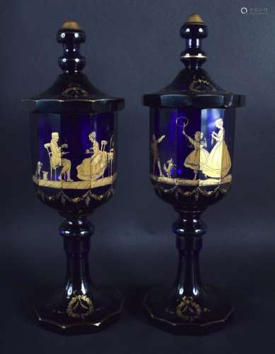 A PAIR OF 19TH CENTURY BRISTOL BLUE VASES AND COVERS